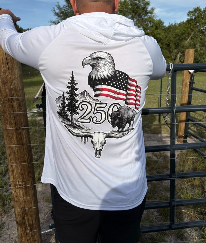 Person wearing white 250th Anniversary Dri-Fit Hoodie with large back graphic